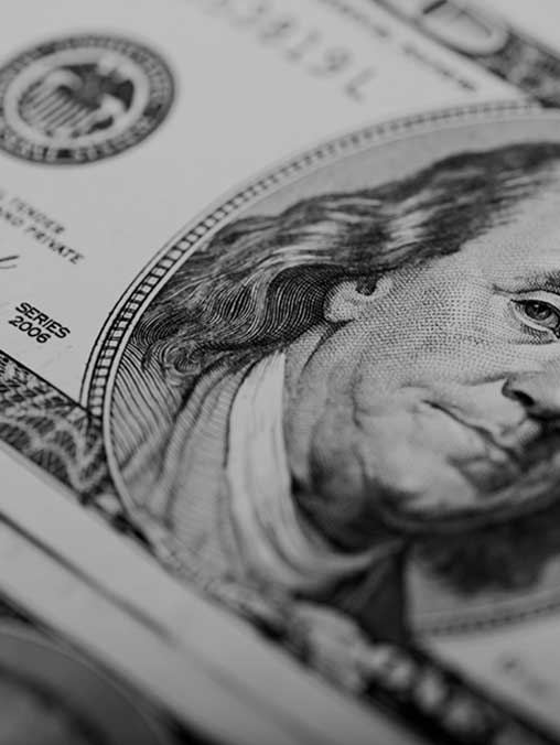 Close up of Benjamin Franklin on Dollar Bill